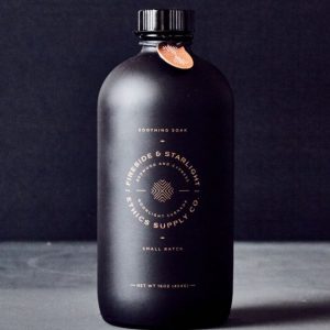 Black round glass coffee bottle