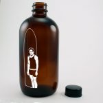 Amber round glass Kombucha tea bottle
