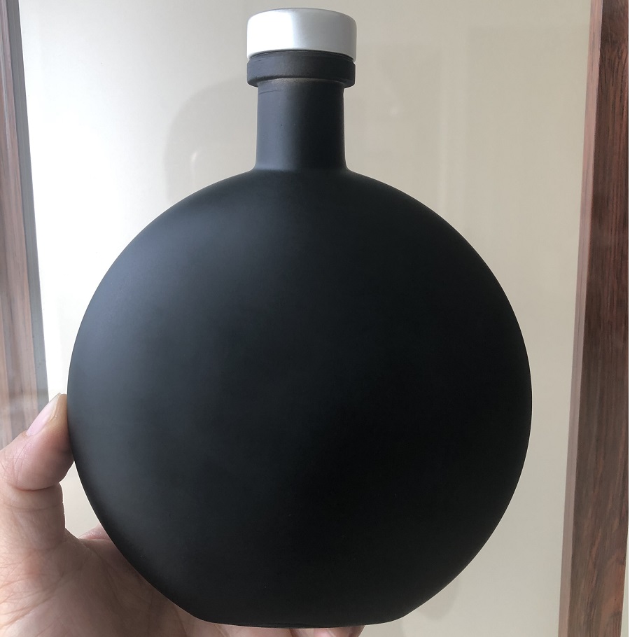 Download 250ml black disc round glass bottle with cork - Glass Bottle & Jars Wholesale - MyEasyGlass