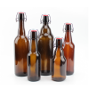 amber swing top bottles in different shapes and sizes