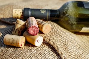 green wine bottle with cork