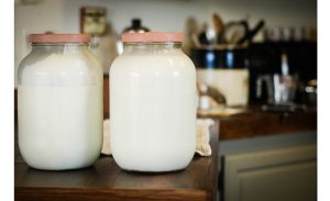 milk in big glass jars