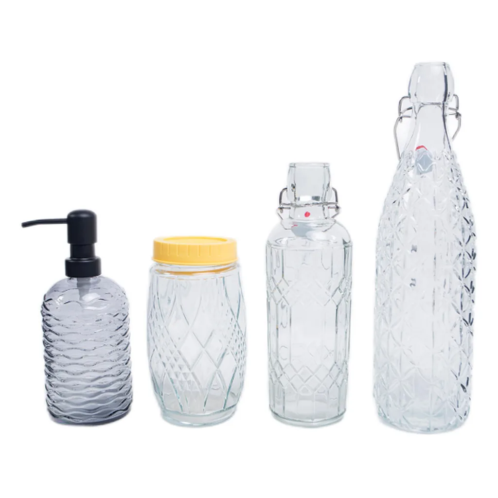 Custom glass bottle design examples in different shapes and closures
