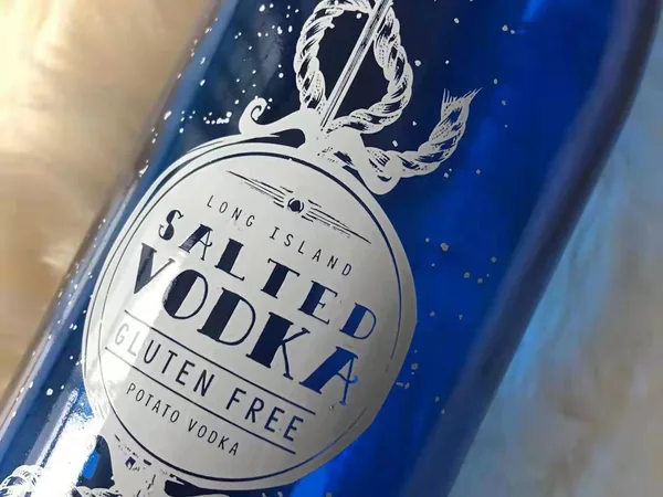 Custom decoration on glass bottle (printing and coating finish)